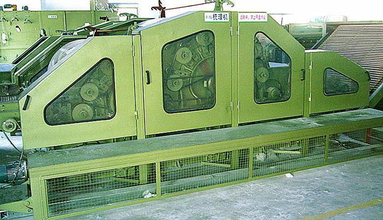 高速梳理機、梳理機頭